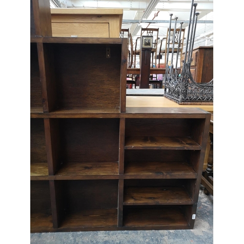 260 - A modern pine fifteen section shelving unit - approx. 107cm high x 120cm wide x 12cm deep