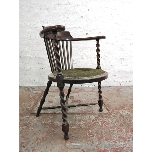 265 - An early/mid 20th century stained beech and green upholstered barley twist armchair - approx. 77cm h... 