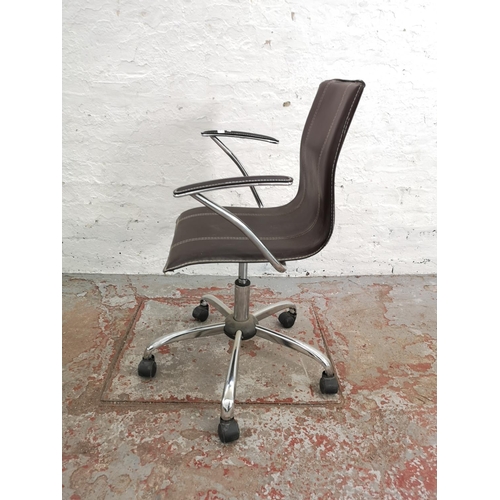 266 - A modern brown leatherette and chrome plated swivel office desk chair