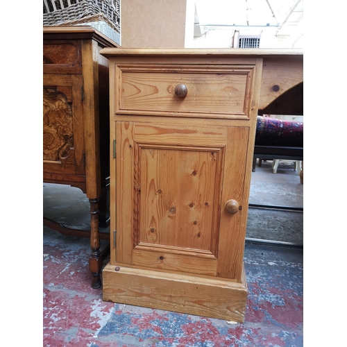 276 - A modern solid pine pedestal desk with five drawers and single cupboard door - approx. 75.5cm high x... 