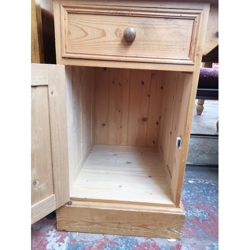 276 - A modern solid pine pedestal desk with five drawers and single cupboard door - approx. 75.5cm high x... 