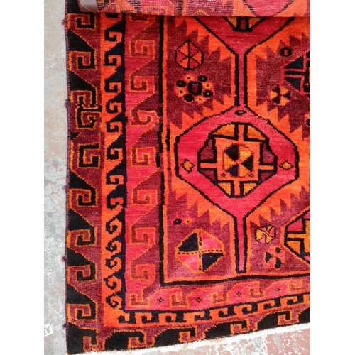 301 - A Taba Tabaee handmade rug - approx. 222cm x 153cm