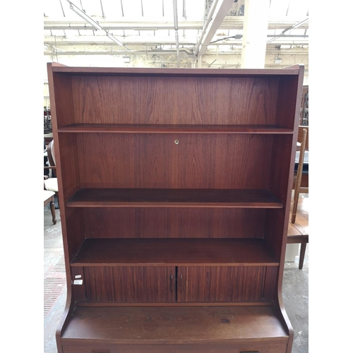 304A - A 1960s Danish Børge Mogensen teak tambour fronted secretaire bookcase - approx. 182cm high x 100cm ... 