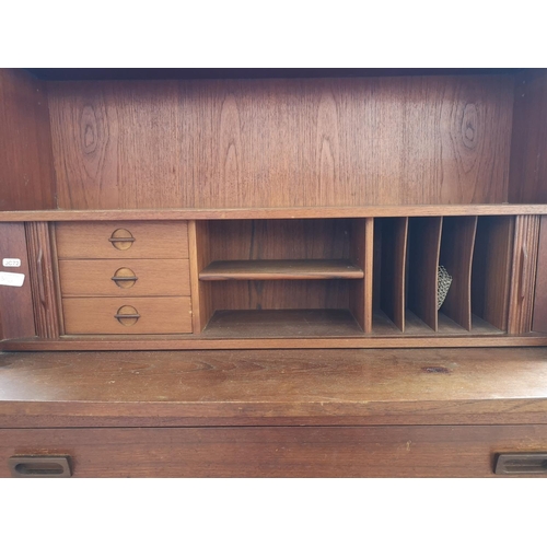 304A - A 1960s Danish Børge Mogensen teak tambour fronted secretaire bookcase - approx. 182cm high x 100cm ... 