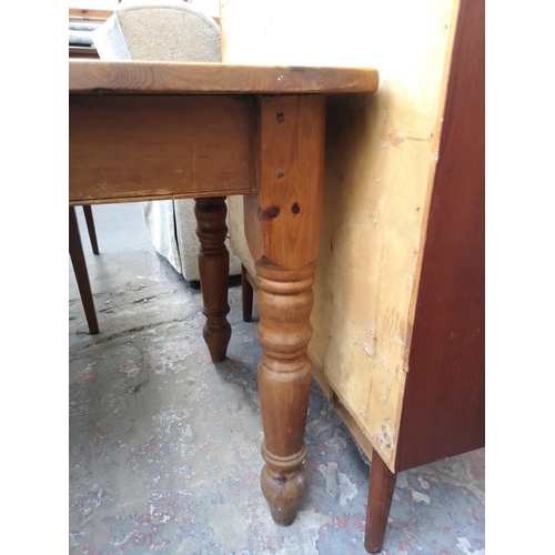 306 - A Victorian style solid pine rectangular farmhouse dining table - approx. 77cm high x 75cm wide x 12... 