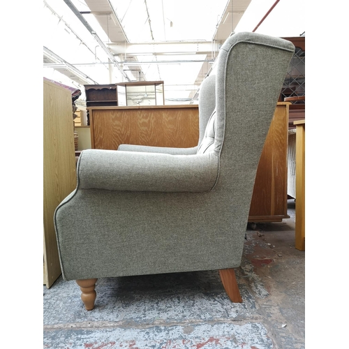 310 - A Next soft herringbone Sherlock buttoned armchair - approx. 100cm high x 80cm wide x 73cm deep