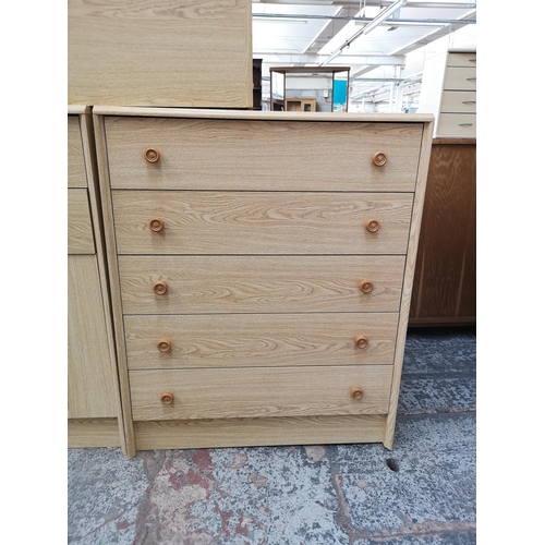 312 - Three pieces of modern oak effect furniture comprising chest of five drawers - approx. 94cm high x 7... 