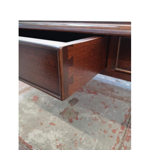 337A - A Regency style mahogany rectangular coffee table with three drawers and brass castors - approx. 48c... 