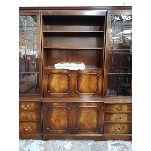 339 - A large Bevan Funnell Reprodux mahogany wall unit - approx. 211cm high x 300cm wide x 47cm deep