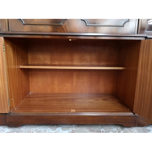 339 - A large Bevan Funnell Reprodux mahogany wall unit - approx. 211cm high x 300cm wide x 47cm deep