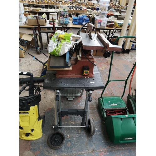 593 - Two items, Stanley Workstation trolley and a Duet table saw with mounted planer