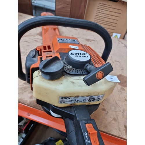 541 - A Stihl HS80 petrol powered hedge trimmer