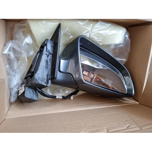 546 - A large collection of various Audi car parts to include S Line steering wheel, boxed Hids 4 U lighti... 