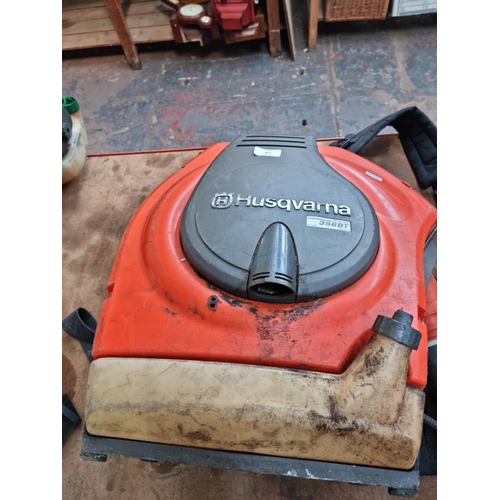 548 - A Husqvarna 356BT petrol powered backpack leaf blower