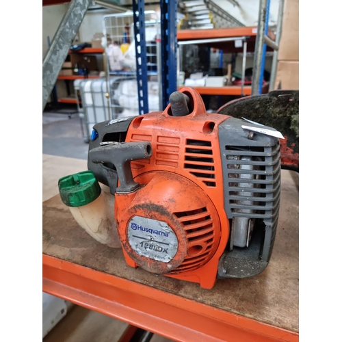 549 - A Husqvarna 128LDX petrol powered strimmer