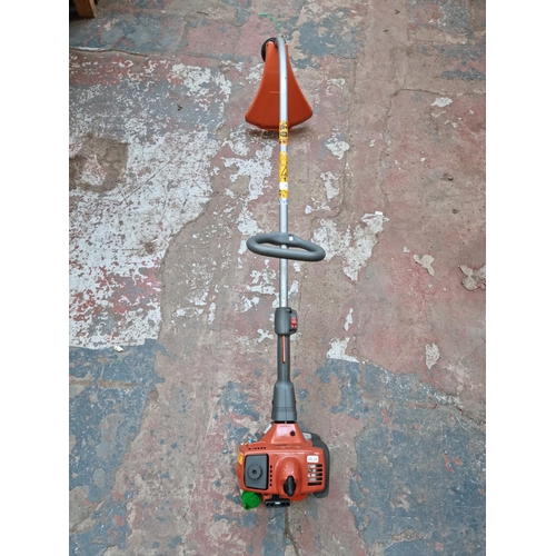 550 - A Husqvarna 322C petrol powered strimmer