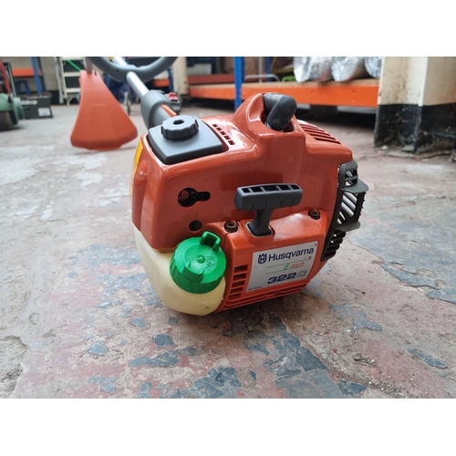 550 - A Husqvarna 322C petrol powered strimmer