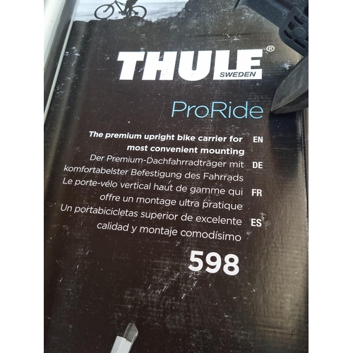 552 - Three items comprising two boxed pairs of Thule ProRide upright bike carriers and one pair of car ro... 