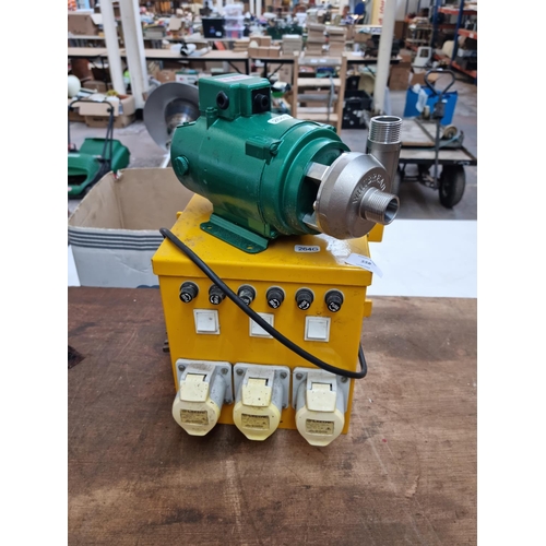 558 - Two items comprising 240v beer pump isolating transformer and Whitbread cast metal pump