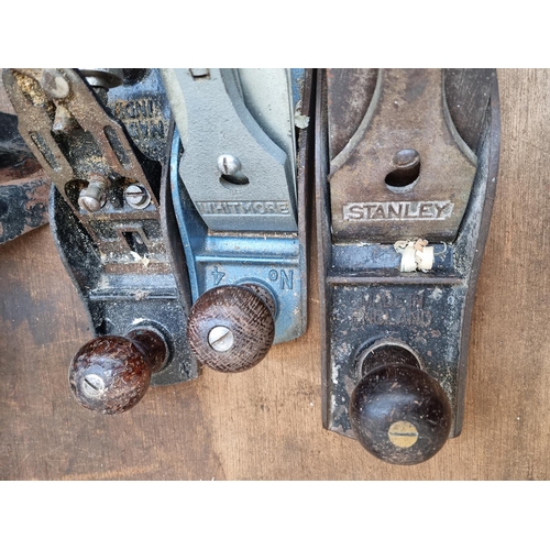 559 - Four items comprising Stanley Bailey wood plane, Whitmore no.4 wood plane, unbranded wood plane and ... 