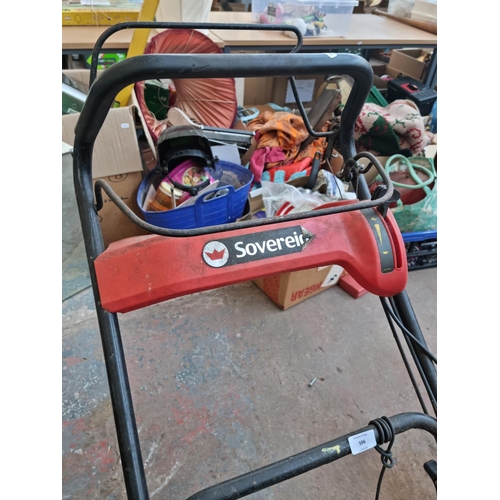 596 - A Sovereign no.50 petrol powered lawnmower with Briggs & Stratton engine