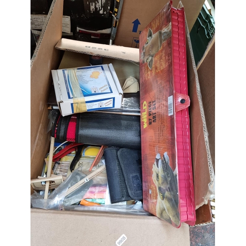 618 - Three boxes and one bag containing assorted house clearance items to include Oriental style vase, We... 