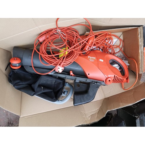 595 - Four pieces of gardening equipment comprising Flymo 240v leaf blower, AL-KO H1100 240v shredder, Bla... 