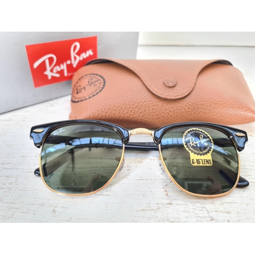 118 - A pair of cased Ray Ban Clubmaster men's sunglasses with 100% UV protection and G-15 lenses