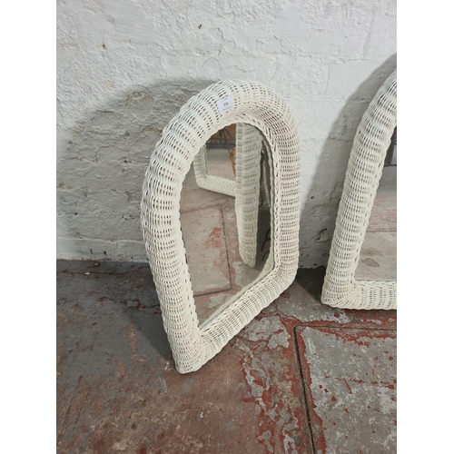 352 - Four wicker items, three white painted wall mirrors - approx. 61cm high x 46cm wide and one carpet b... 