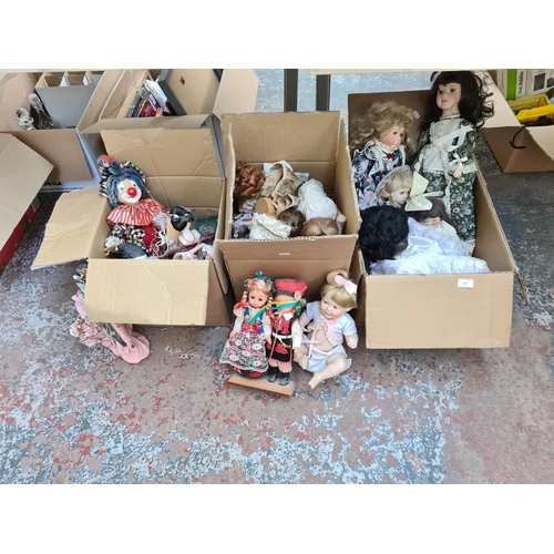 650 - Three boxes containing a large collection of vintage dolls to include Ashton Drake Cute as a Button ... 