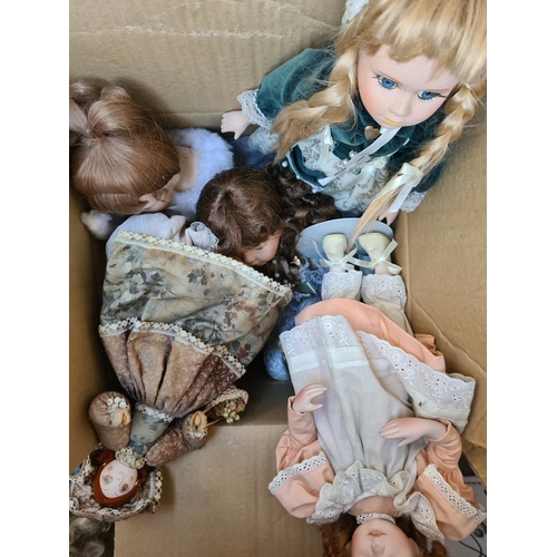 650 - Three boxes containing a large collection of vintage dolls to include Ashton Drake Cute as a Button ... 