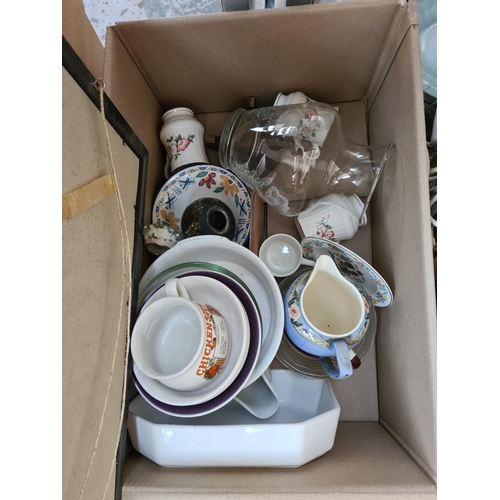 654 - Twelve boxes containing assorted items to include brassware, treenware, Beswick animal figurines, cu... 