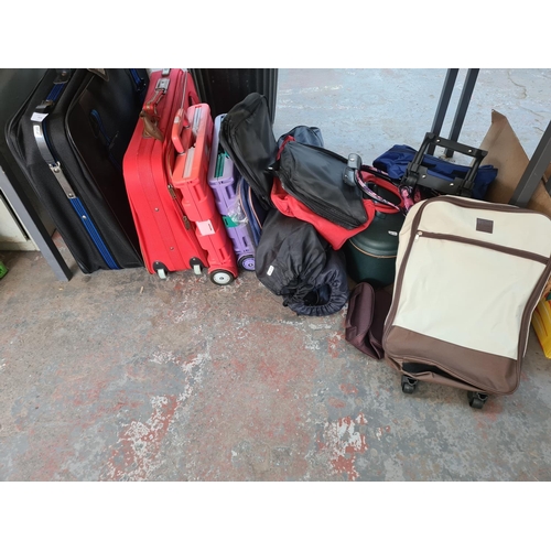 658 - A large collection of assorted travel cases and camping chairs