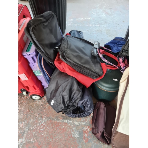 658 - A large collection of assorted travel cases and camping chairs