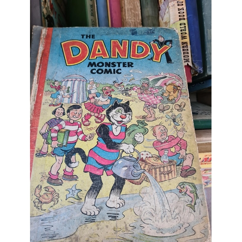 644 - A box containing assorted vintage books to include 1950's Boys book of all sports, The Dandy Monster... 