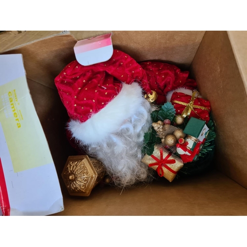 647 - Two boxes containing a large collection of assorted Christmas decorations