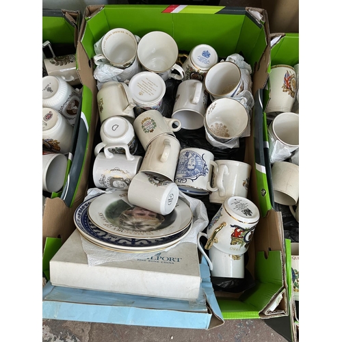 625 - Three boxes containing assorted ceramic commemorative mugs