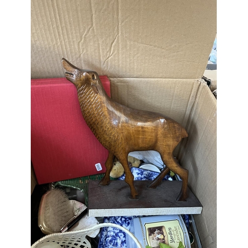 630 - Three boxes of assorted items to include treenware, reciprocating toy cat, ceramics, diecast model b... 