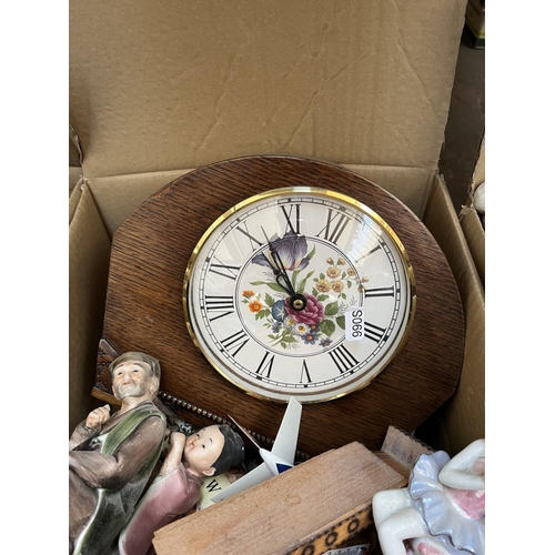 636 - Four boxes containing assorted items to include mid 20th century mantle clock, treenware, vintage me... 