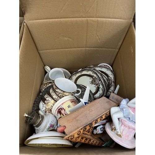 636 - Four boxes containing assorted items to include mid 20th century mantle clock, treenware, vintage me... 