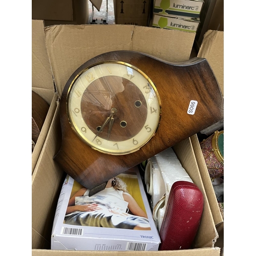 636 - Four boxes containing assorted items to include mid 20th century mantle clock, treenware, vintage me... 