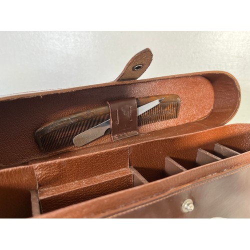 206 - Two leather cased travel grooming sets, one ebony and bakelite men's shaving and one women's vanity ... 