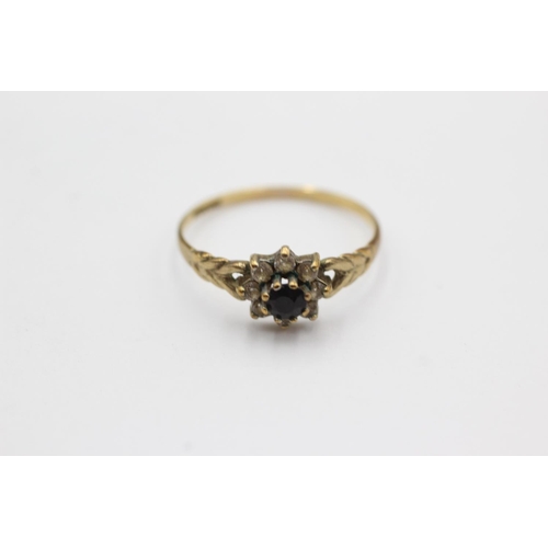 1001 - A 9ct gold clear gemstone and sapphire dress ring, size M½ - approx. gross weight 1.1 grams