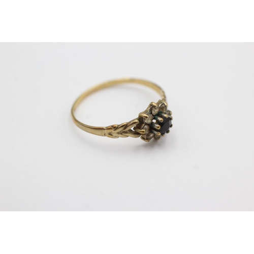 1001 - A 9ct gold clear gemstone and sapphire dress ring, size M½ - approx. gross weight 1.1 grams