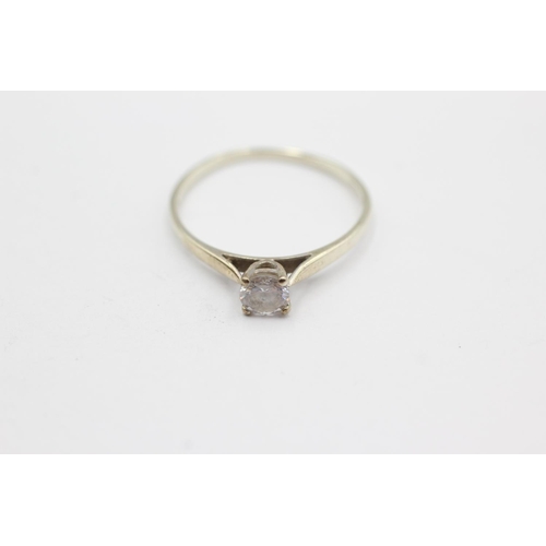 1002 - A hallmarked Birmingham 9ct gold clear gemstone solitaire ring, size O½ - approx. gross weight 1.2 g... 