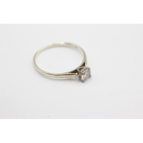 1002 - A hallmarked Birmingham 9ct gold clear gemstone solitaire ring, size O½ - approx. gross weight 1.2 g... 