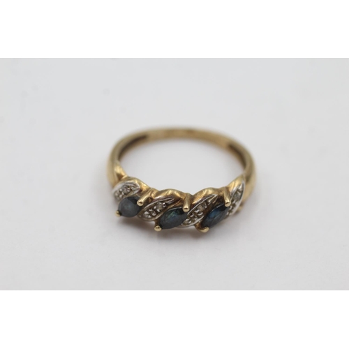 1005 - A 9ct gold sapphire and diamond stylised dress ring, size N½ - approx. gross weight 2.1 grams