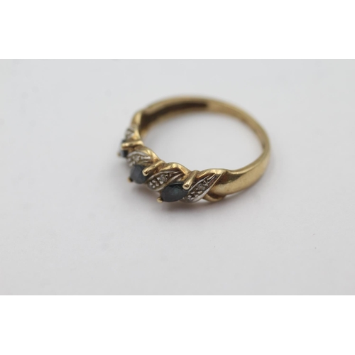 1005 - A 9ct gold sapphire and diamond stylised dress ring, size N½ - approx. gross weight 2.1 grams