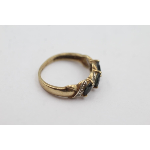 1005 - A 9ct gold sapphire and diamond stylised dress ring, size N½ - approx. gross weight 2.1 grams