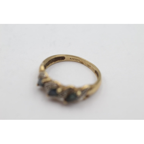 1005 - A 9ct gold sapphire and diamond stylised dress ring, size N½ - approx. gross weight 2.1 grams